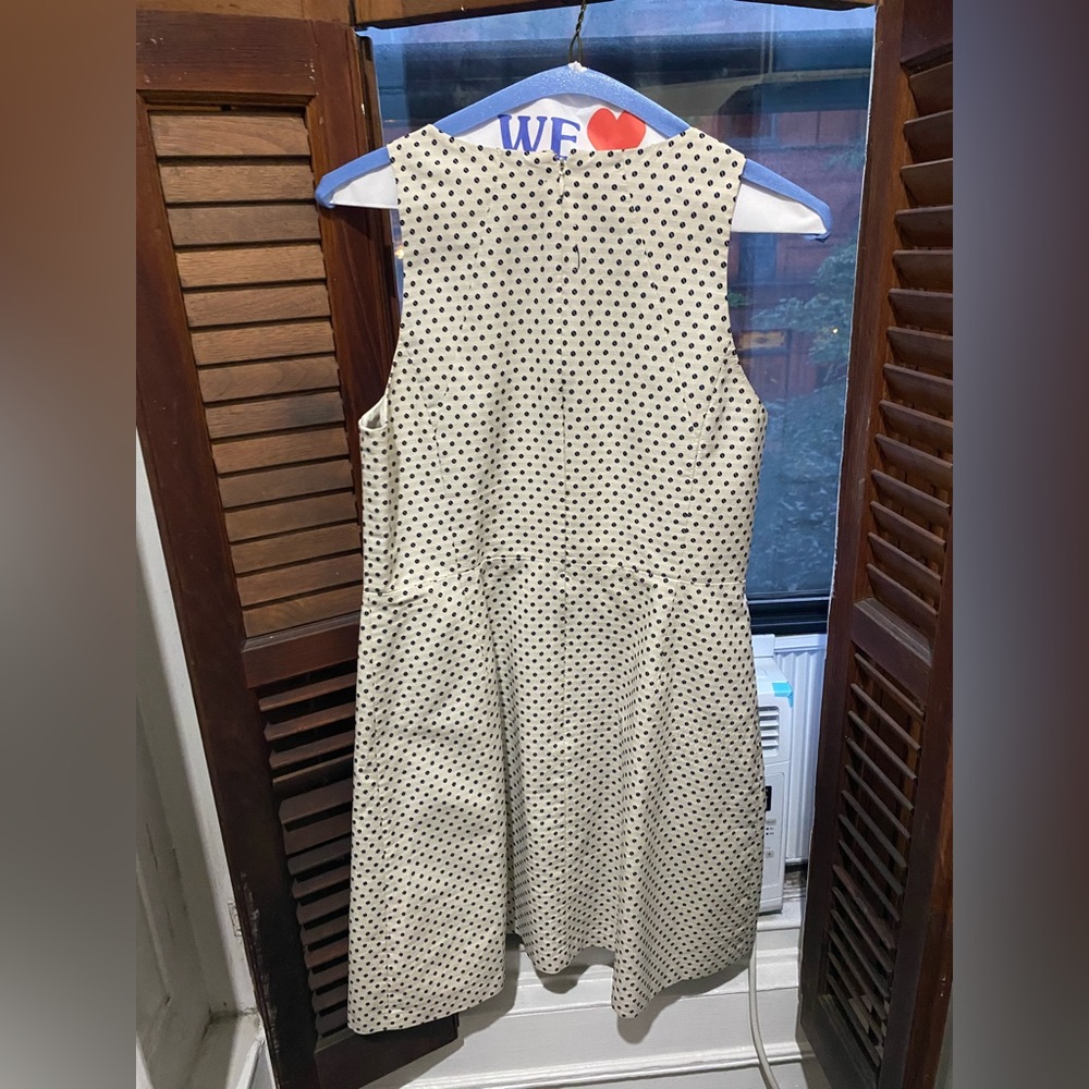 Flattering a-line polka dot dress. Perfect for work!